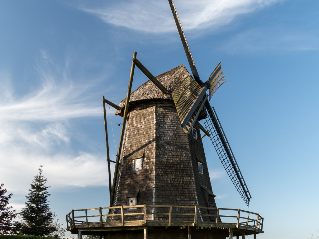 Traditional mountain gristmill stone slowly grinding pure foxtail millet grain